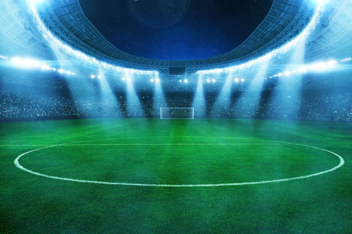A football stadium at night under stadium lights